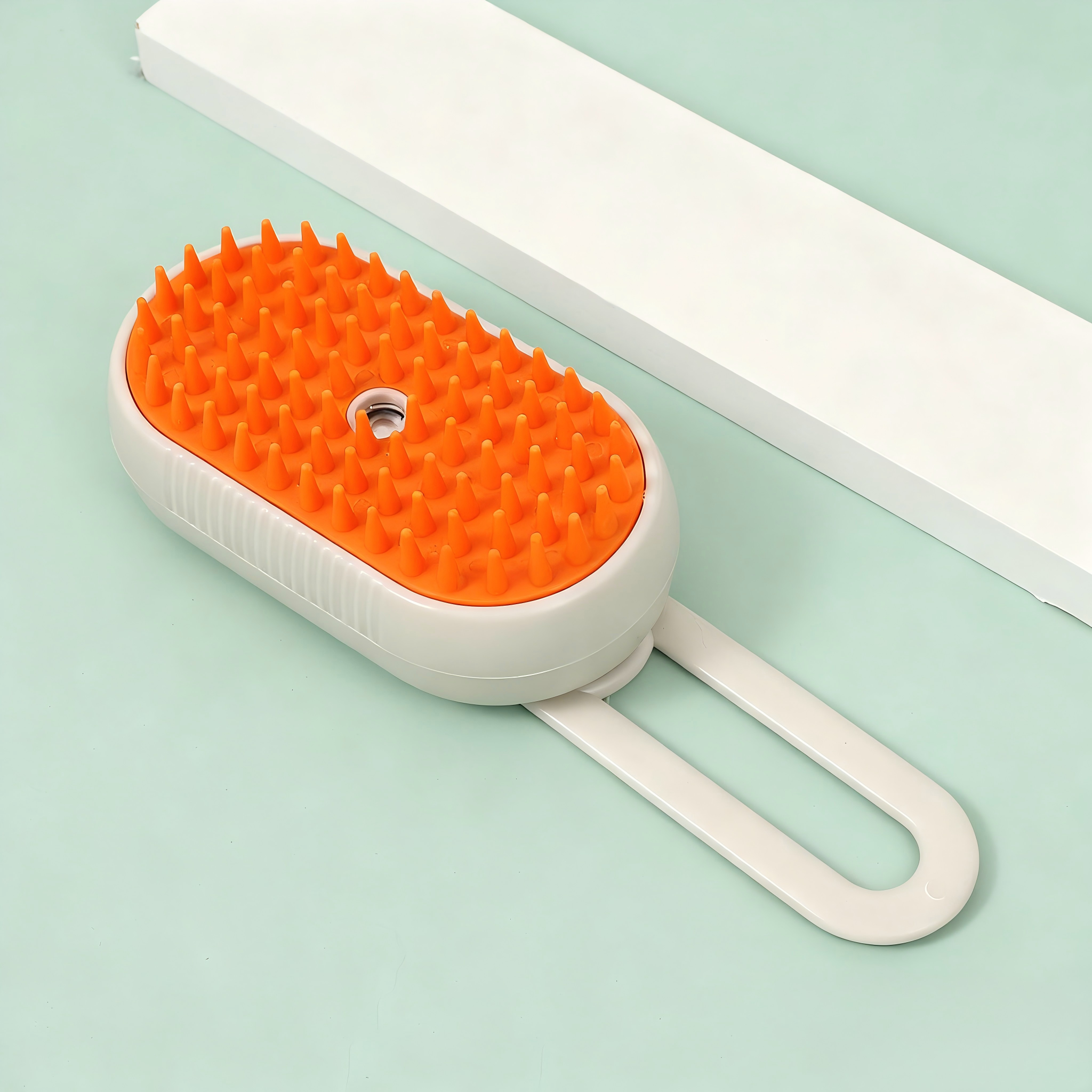 cepillo de gato y perro a vapor